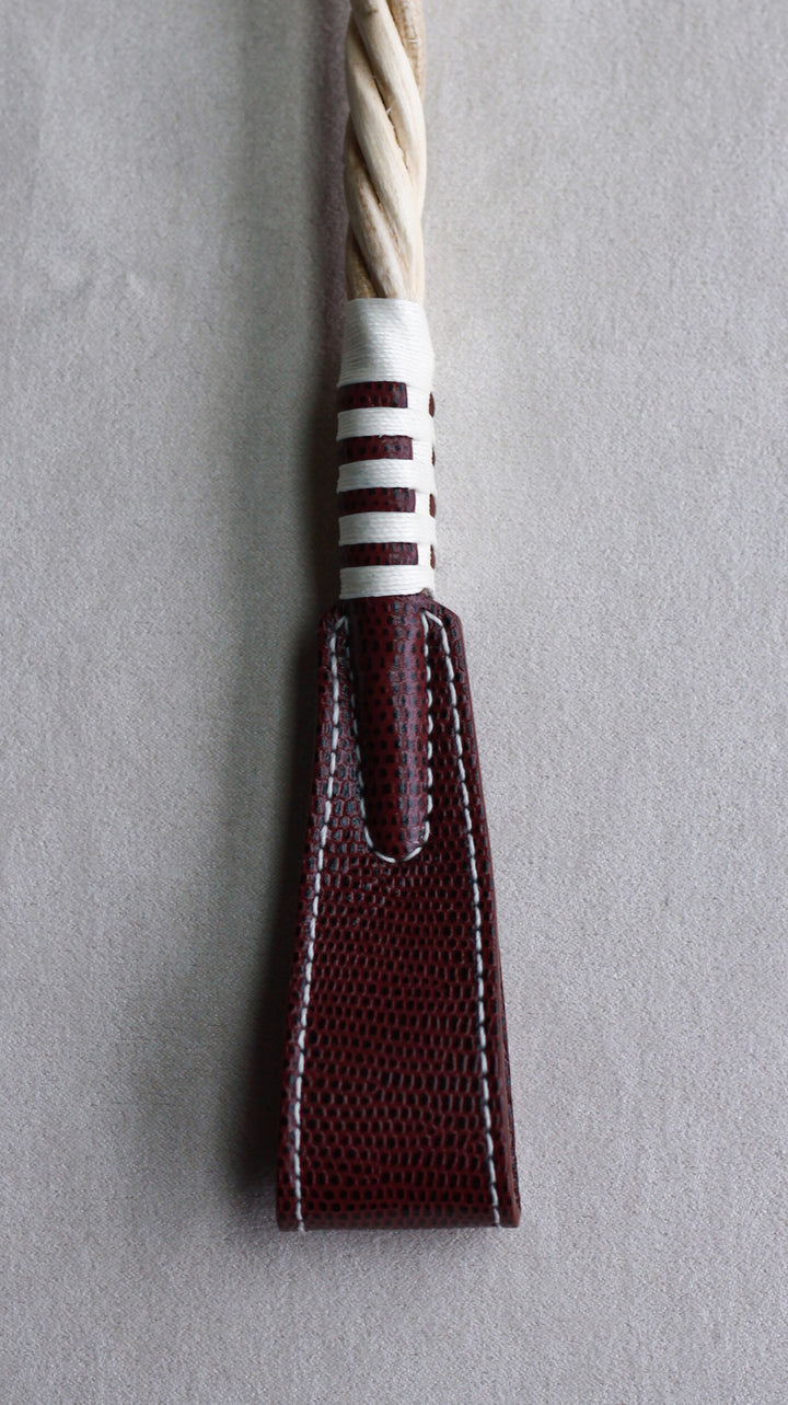 paddle riding crop purple