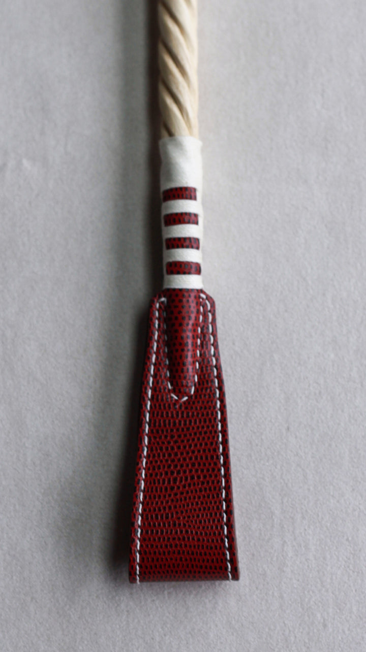 paddle riding crop red